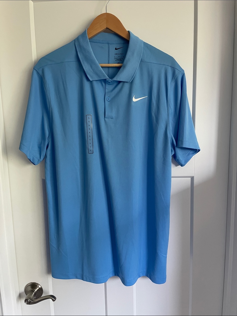 Nike Men’s Light Blue Dri-FIT Polo with White Swoosh